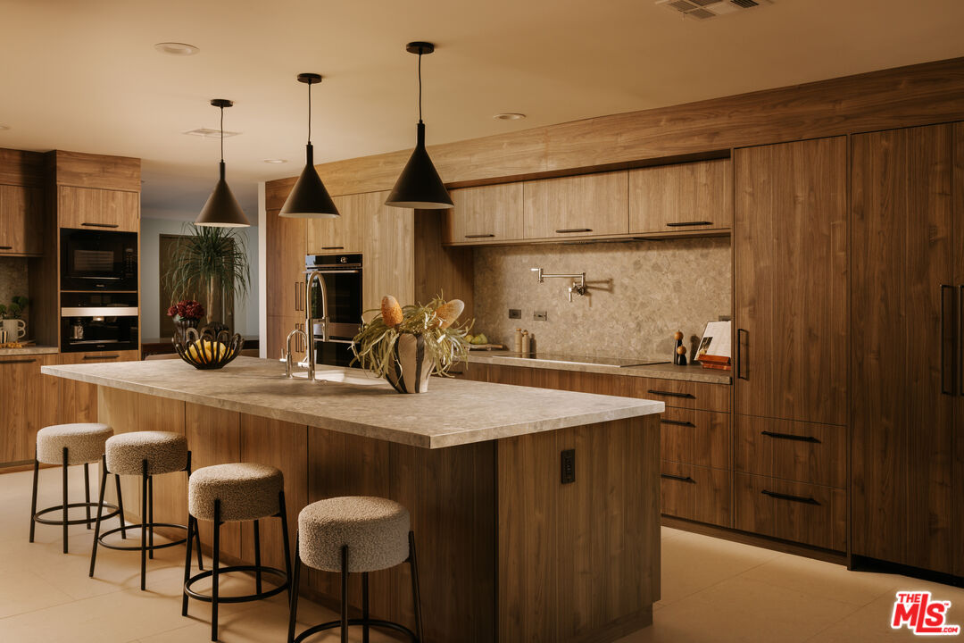 Custom walnut kitchen at Venus Drive